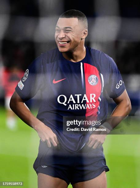 Kylian Mbappe of Paris Saint-Germain celebrates at full-time following their team's victory in the UEFA Champions League match between Paris...