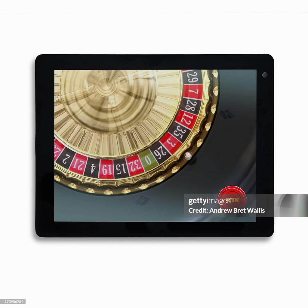 Roulette Wheel Gambling On Mobile Computer Devices High-Res Stock Photo ...