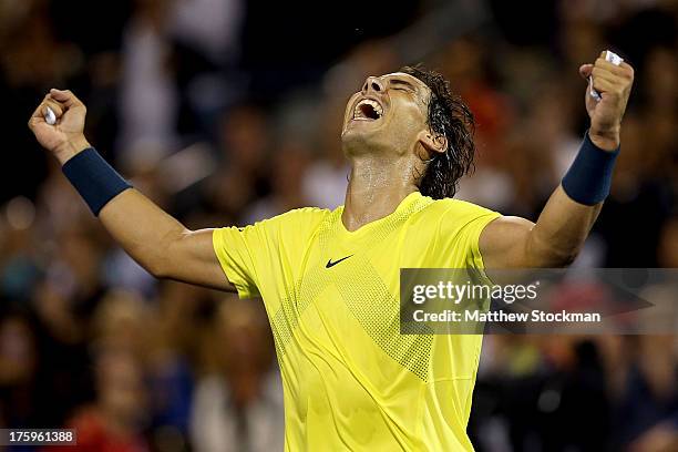 Rafael Nadal of Spain celebrates his win over Novak Djokovic of Serbia during the semifinals of the Rogers Cup at Uniprix Stadium on August 10, 2013...