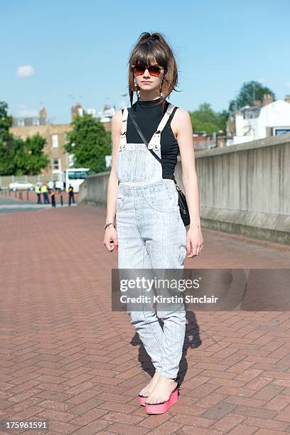 Fashion graduate Shirley Webb wears e-bay dungarees, Dina and Aussie shoes, Vintage sunglasses and bag on day 4 of Graduate Fashion week on June 05,...