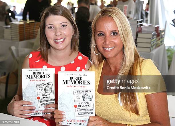 Katie Beers and Carolyn Gusoff attend the East Hampton Library's Authors Night 2013 at Gardiner's Farm on August 10, 2013 in East Hampton, New York.