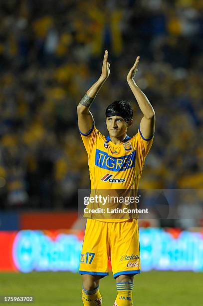 Alan Pulido of Tigres celebrates at the end of a match between Tigres and Monterrey as part of Apertura 2013 Tournament, at Universitario stadium, on...