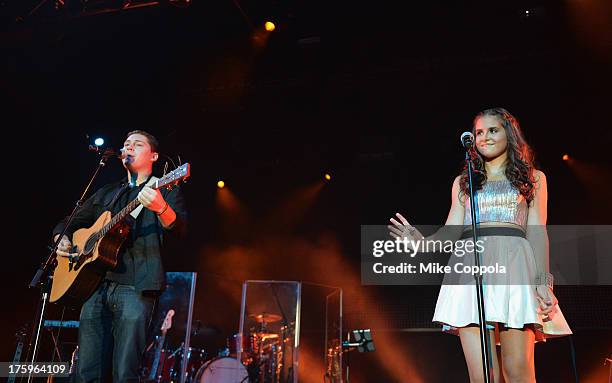 Musician Cris Cab and singer/actress Carly Rose Sonenclar perform at Best Buy Theater on August 10, 2013 in New York City.