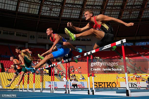 Pascal Behrenbruch of Germany and Ilya Shkurenev of Russia compete in the Men's Decathlon 110 metres hurdles during Day Two of the 14th IAAF World...