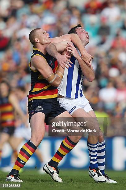 Sam Jacobs of The Crows competes in the ruck with Todd Goldstein of The Kangaroos during the round 20 AFL match between the Adelaide Crows and the...