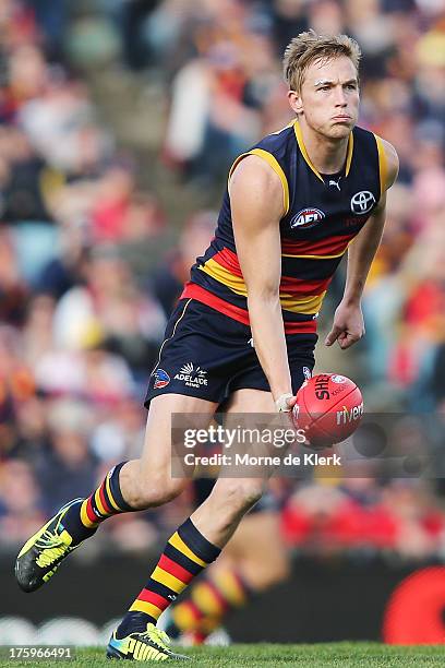 Bernie Vince of The Crows runs with the ball during the round 20 AFL match between the Adelaide Crows and the North Melbourne Kangaroos at AAMI...