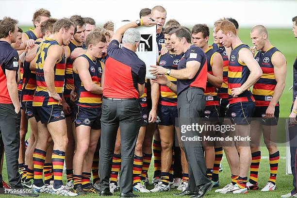 Brenton Sanderson of The Crows speaks to his team during the round 20 AFL match between the Adelaide Crows and the North Melbourne Kangaroos at AAMI...