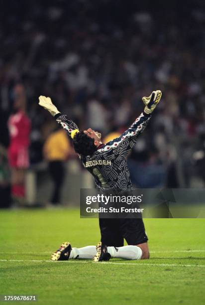 Iran goalkeeper and captain Ahmad Reza Abedzadeh celebrates victory in the 1998 FIFA World Cup Finals match against USA at Stade de Gerland on June...