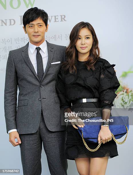 Jang Dong-Gun and wife Ko So-Young attend Lee Byung-Hun and Lee Min-Jung's wedding at Grand Hyatt Hotel on August 10, 2013 in Seoul, South Korea.