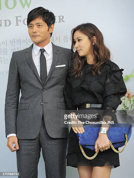 Jang Dong-Gun and wife Ko So-Young attend Lee Byung-Hun and Lee Min-Jung's wedding at Grand Hyatt Hotel on August 10, 2013 in Seoul, South Korea.