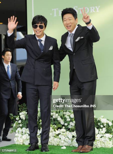 Kim Min-Jong and Kim Su-Ro attend Lee Byung-Hun and Lee Min-Jung's wedding at Grand Hyatt Hotel on August 10, 2013 in Seoul, South Korea.