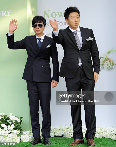 Kim Min-Jong and Kim Su-Ro attend Lee Byung-Hun and Lee Min-Jung's wedding at Grand Hyatt Hotel on August 10, 2013 in Seoul, South Korea.