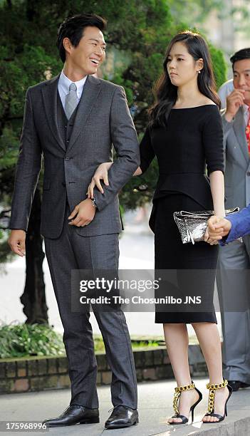 Yeon Jung-Hoon and wife Han Ga-In attend Lee Byung-Hun and Lee Min-Jung's wedding at Grand Hyatt Hotel on August 10, 2013 in Seoul, South Korea.