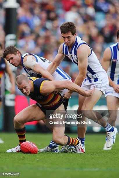 Scott Thompson of The Crows competes for the ball during the round 20 AFL match between the Adelaide Crows and the North Melbourne Kangaroos at AAMI...