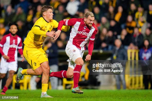 Viktor Boone of Lierse K. Battles for possession with Vincent Janssen of Royal Antwerp FC during the Croky Cup match between Lierse K. And Royal...