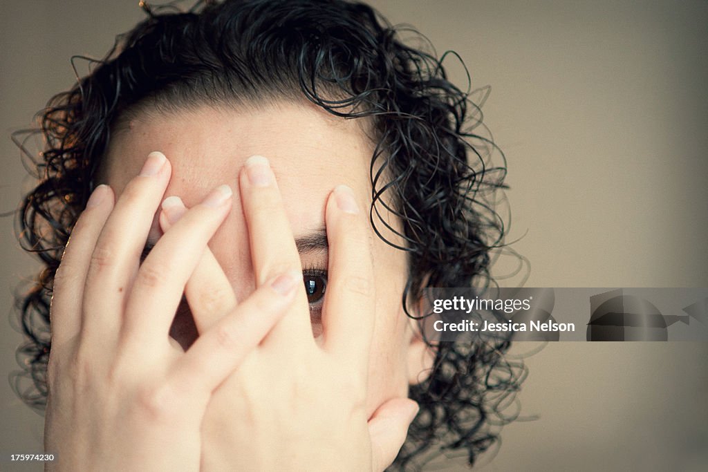 Woman Covering Face