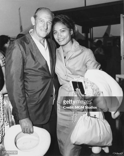Producer Aaron Rosenberg with French Polynesian actress Tarita Teriipia at Los Angeles International Airport on their return from location filming in...