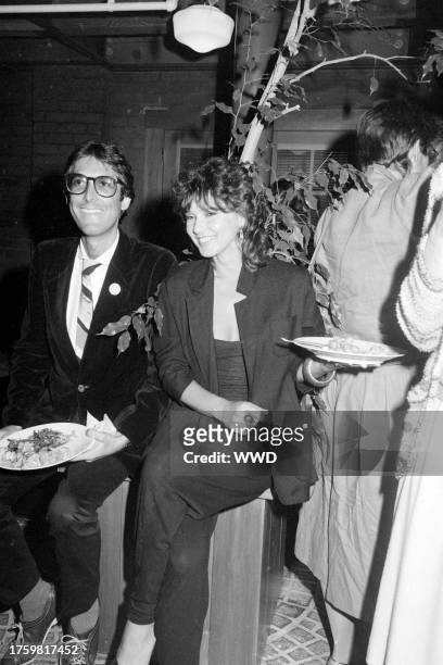 Stephen Bishop and Maria Richwine attend a party in Los Angeles, California, on July 13, 1982.