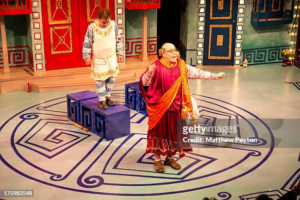 Actor Conrad John Shuck takes a bow at Opening Night: A Funny Thing Happened On The Way To The Forum at Bay Street Theatre on August 10, 2013 in Sag...