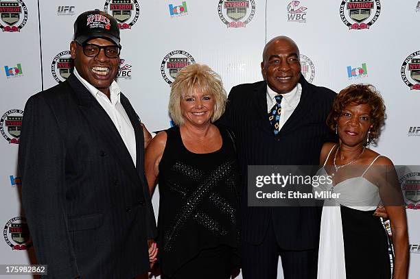 Former boxer Leon Spinks, his wife Brenda Spinks, former boxer Earnie Shavers and his fiancee Marsha Josey arrive at the Nevada Boxing Hall of Fame...