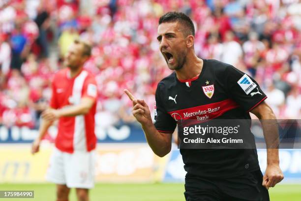 Vedad Ibisevic of Stuttgart celebrates his team's first goal during the Bundesliga match between 1. FSV Mainz 05 and VfB Stuttgart at Coface Arena on...