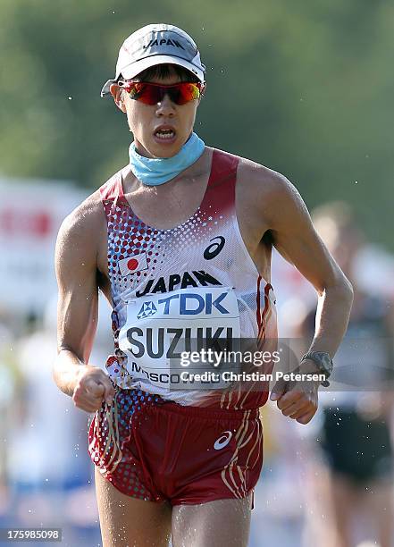 Yusuke Suzuki of Japan compete in the Men's 20km Race Walk final during Day Two of the 14th IAAF World Athletics Championships Moscow 2013 at...