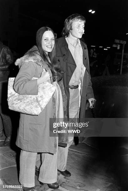 Marcheline Bertrand , pregnant with daughter Angelina Jolie, and Jon Voight attend a preview screening of "The Day of the Locust" at the Westwood...