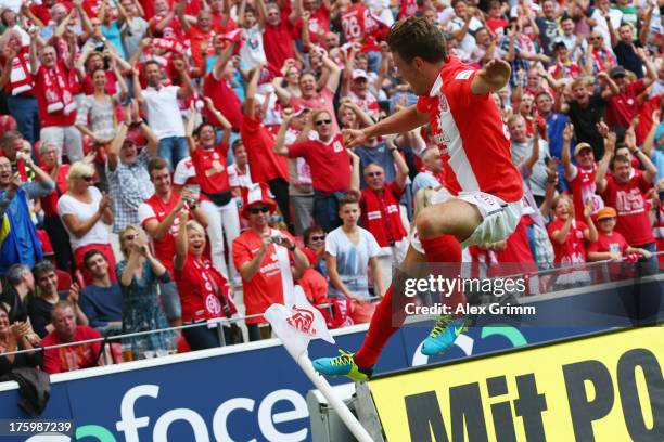 Nicolai Mueller of Mainz celebrates his team's third goal during the Bundesliga match between 1. FSV Mainz 05 and VfB Stuttgart at Coface Arena on...