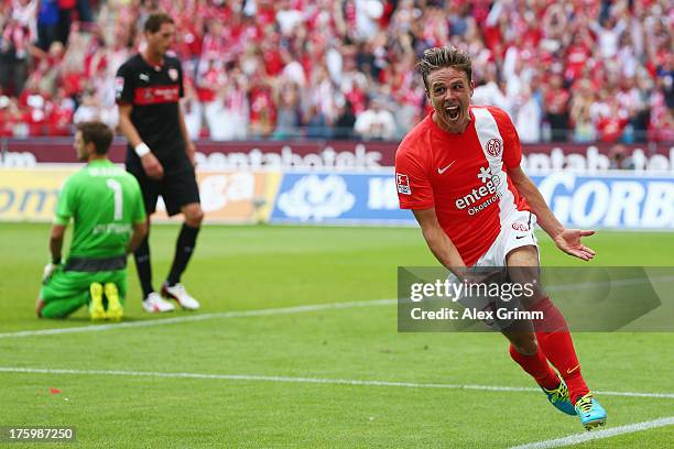 Nicolai Mueller of Mainz celebrates his team's third goal during the Bundesliga match between 1. FSV Mainz 05 and VfB Stuttgart at Coface Arena on...