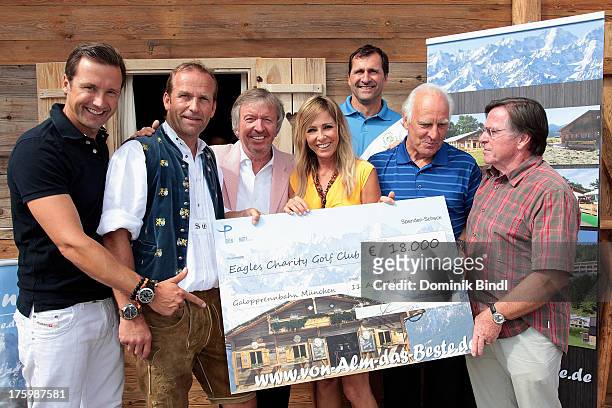 Norbert Dobeleit, Stefan Ermert, Werner Schulze Erdel, Gundis Zambo, Lars Riedl, Franz Roth and Elmar Wepper attend the EAGLES charity homepage...