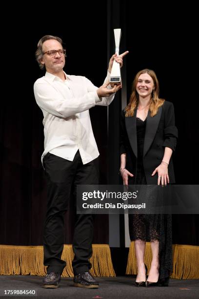 Peter Sarsgaard and Jocelyn Shelfo pose onstage at the Vanguard Award Presentation during 26th SCAD Savannah Film Festival at Trustees Theater on...