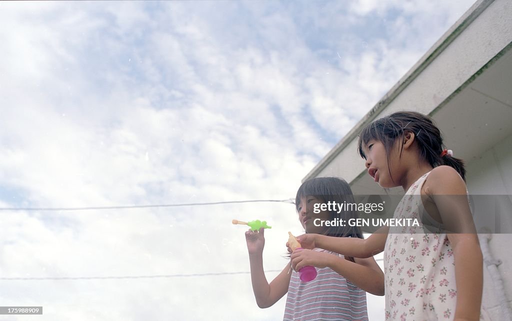 The girl who blows a bubble