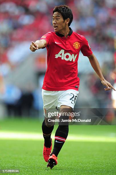 Shinji Kagawa of Manchester United reacts during the FA Community Shield match between Manchester United and Wigan Athletic at Wembley Stadium on...