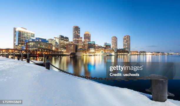 boston skyline in winter panorama - boston winter stock pictures, royalty-free photos & images