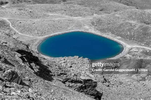 high angle view of lake - gerold guggenbuehl stock pictures, royalty-free photos & images