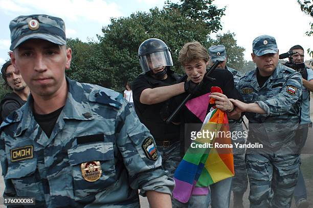 Daniil Grachev, a gay rights activist, is arrested by riot police during a Gay Pride event in St. Petersburg, June 29, 2013. Demonstrating LGBT...