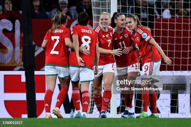 Ceri Holland of Wales celebrates scoring her teams first goal of the game with Hannah Cain during the UEFA Women's Nations League League A - Group A3...