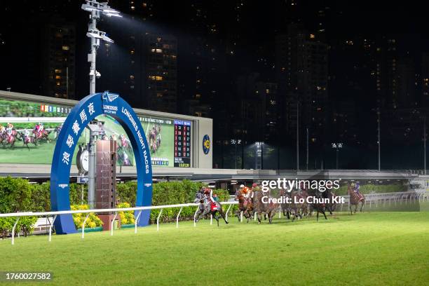 Jockeys compete in the Race 7 Racing Spirit Handicap at Happy Valley Racecourse on October 18, 2023 in Hong Kong.