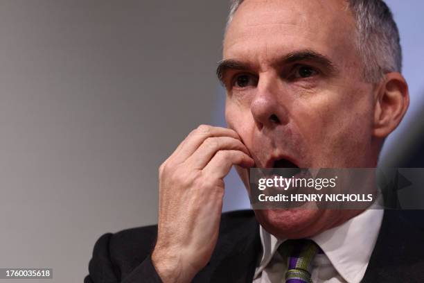 Deputy Governor, Monetary Policy of the Bank of England Ben Broadbent reacts as he attends a press conference concerning interest rates, at the Bank...