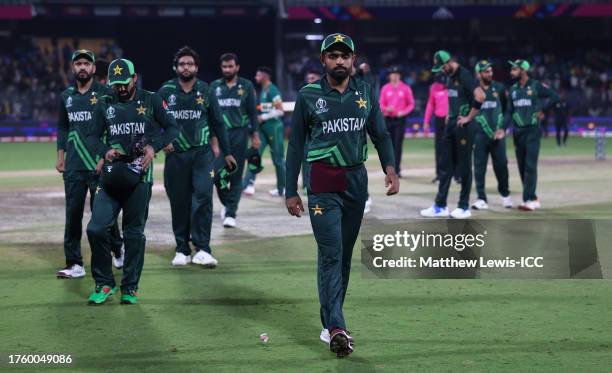 Babar Azam of Pakistan leads their side off following the ICC Men's Cricket World Cup India 2023 between Pakistan and South Africa at MA Chidambaram...