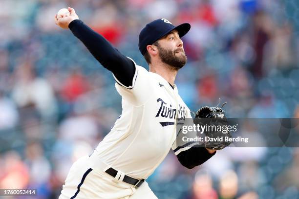 Dylan Floro of the Minnesota Twins delivers a pitch against the Texas Rangers in the 13th inning at Target Field on August 27, 2023 in Minneapolis,...