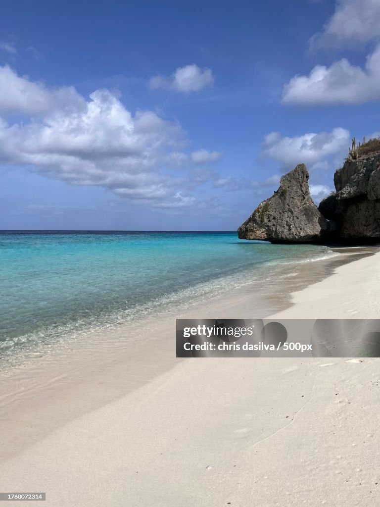 Scenic view of beach against sky,Curacao