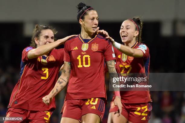 Jennifer Hermoso of Spain celebrates with teammates Teresa Abelleira and Athenea del Castillo after scoring the team's first goal during the UEFA...