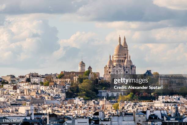 paris skyline with sacre coeur basilica and montmartre, paris, france - paris france skyline stock pictures, royalty-free photos & images