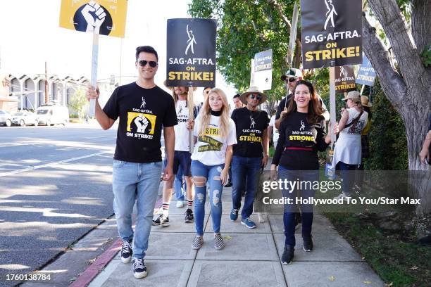 Kash Hovey, Samantha Bailey and Kira Reed Lorsch walk the picket line at the SAG-AFTRA strike on November 1, 2023 at Warner Brothers Studios in...