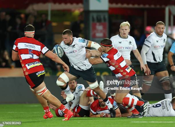 Kirill Gotovtsev of Gloucester Rugby tackles Tom Willis of Saracens during the Gallagher Premiership Rugby match between Gloucester Rugby and...
