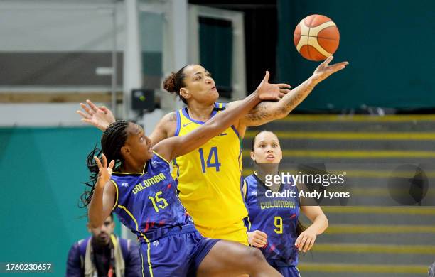 Erika De Souza of Team Brazil and Tania Valencia of Team Colombia in Women's Team Basketball at Polideportivo 1 during Santiago 2023 Pan Am Games day...