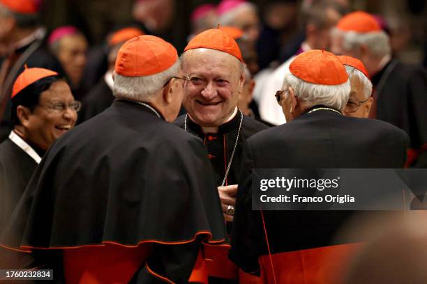 Cardinal Gianfranco Ravasi chats with cardinals during the prayer service for Peace in the Middle East at St Peter’s Basilica on October 27, 2023 in...