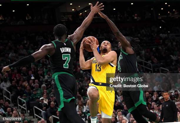 Boston, MA Boston Celtics SG Jaylen Brown and PG Jrue Holiday guard Indiana Pacers PF Jordan Nwora in the third quarter. The Celtics beat the Pacers,...