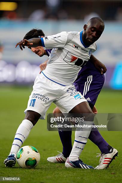 Sacha Kljestan of Anderlecht and Herve Kage of Gent battle for the ball during the Jupiler League match between RSC Anderlecht and KAA Gent held at...